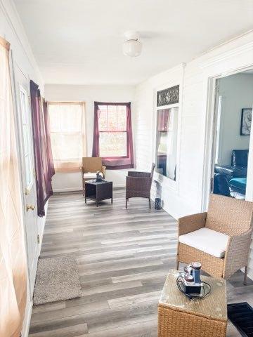 221 E Main St, Genoa, IL 60135 - sitting room featuring wood finished floors