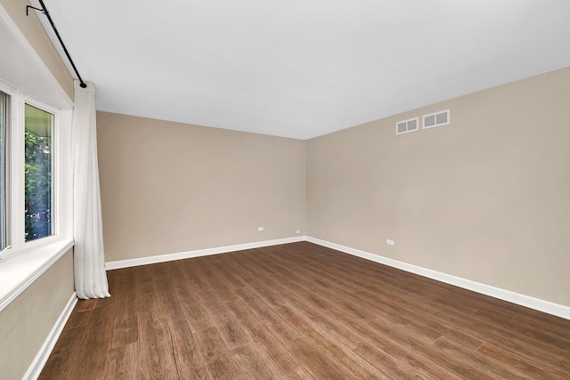 2314 Hasting Dr, Plainfield, IL 60586 - empty room with wood finished floors and baseboards