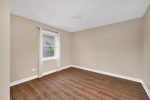 2314 Hasting Dr, Plainfield, IL 60586 - empty room with baseboards and dark wood-type flooring