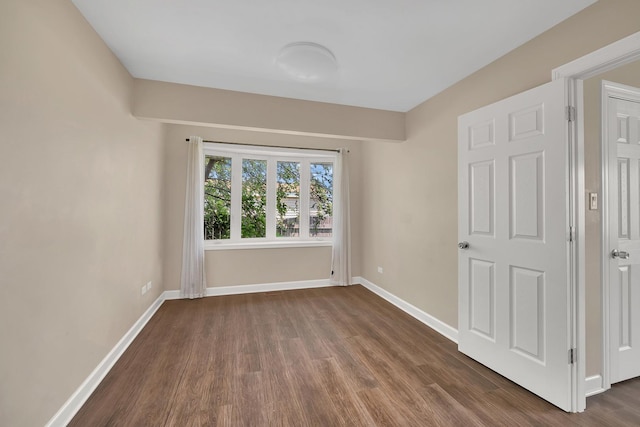 2314 Hasting Dr, Plainfield, IL 60586 - spare room featuring dark wood-style flooring and baseboards