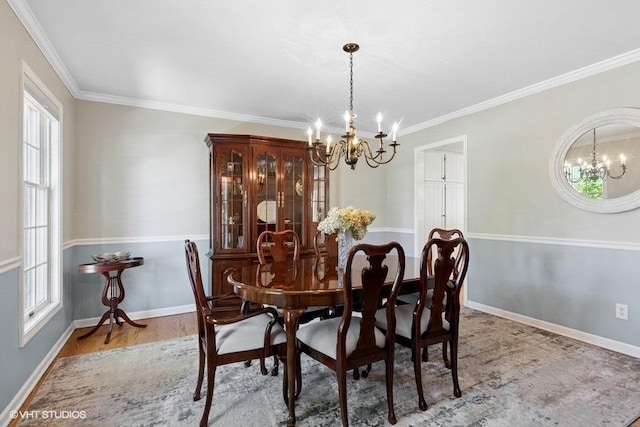 2325 Fairfax Rd, Saint Charles, IL 60174 - dining space with a chandelier, wood finished floors, and crown molding