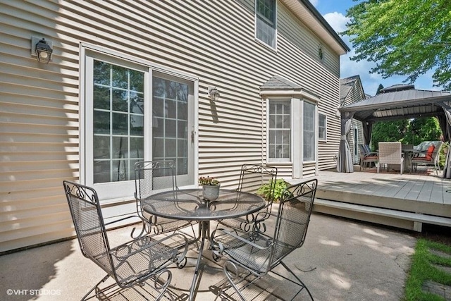 2325 Fairfax Rd, Saint Charles, IL 60174 - view of patio / terrace with outdoor dining area, a gazebo, and a wooden deck