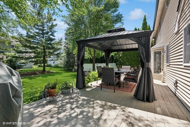 2325 Fairfax Rd, Saint Charles, IL 60174 - deck with outdoor dining area, a gazebo, a grill, and a lawn