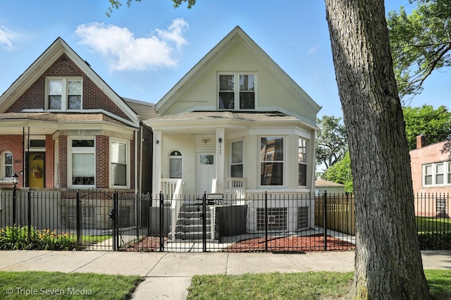 3425 W Carroll Ave, Chicago, IL 60624 - view of front of property with brick siding and a fenced front yard