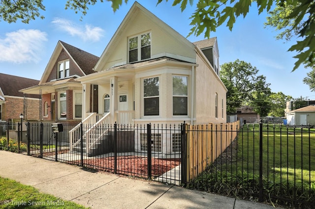 3425 W Carroll Ave, Chicago, IL 60624 - view of front of home featuring a fenced front yard and brick siding