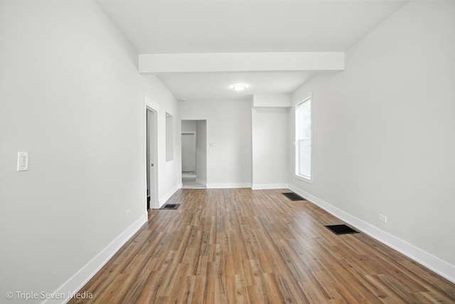 3425 W Carroll Ave, Chicago, IL 60624 - empty room with baseboards and wood finished floors