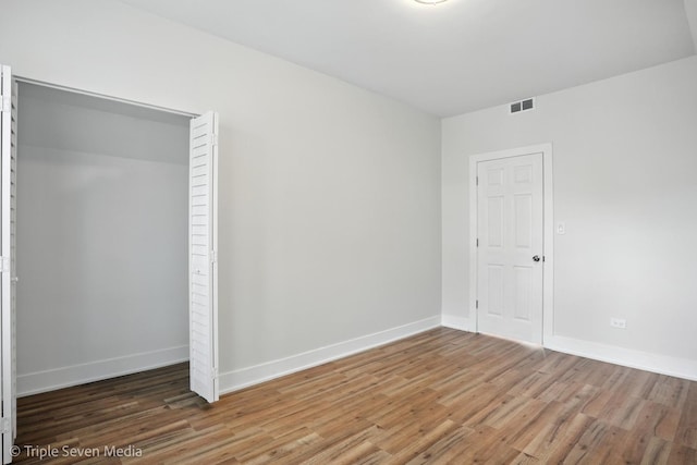 3425 W Carroll Ave, Chicago, IL 60624 - unfurnished bedroom with light wood-type flooring