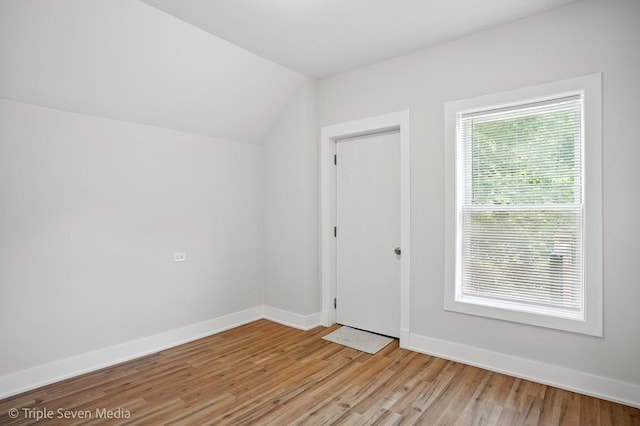 3425 W Carroll Ave, Chicago, IL 60624 - bonus room featuring light wood-style floors and vaulted ceiling