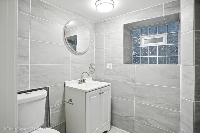 3425 W Carroll Ave, Chicago, IL 60624 - bathroom with tile walls and vanity