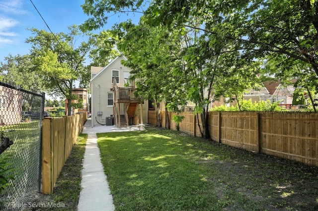 3425 W Carroll Ave, Chicago, IL 60624 - fenced backyard featuring stairs