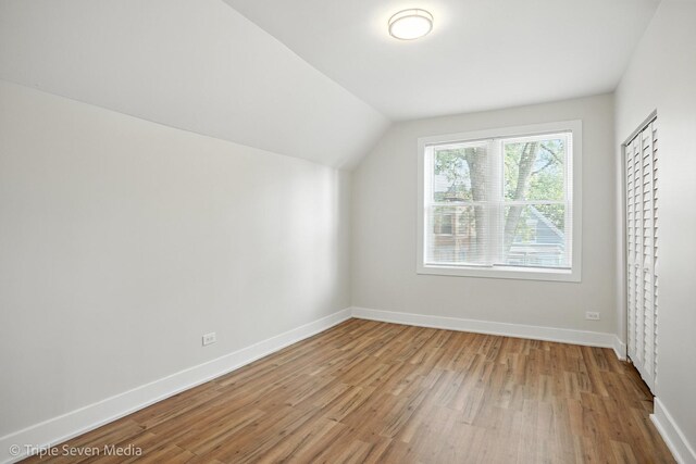 3425 W Carroll Ave, Chicago, IL 60624 - additional living space with wood finished floors and lofted ceiling