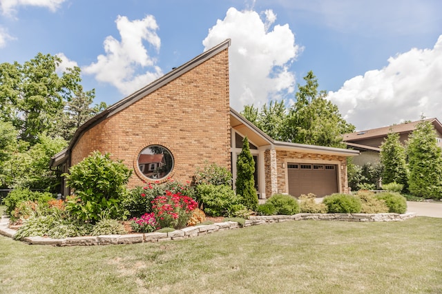 908 Claremont Dr, Downers Grove, IL 60516 - view of front facade with a garage, brick siding, a front yard, and driveway