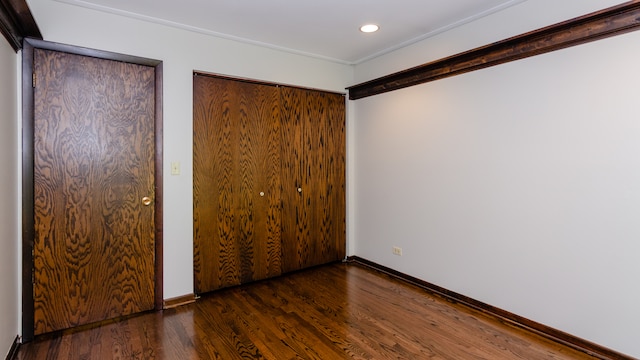 908 Claremont Dr, Downers Grove, IL 60516 - unfurnished bedroom with wood finished floors and recessed lighting