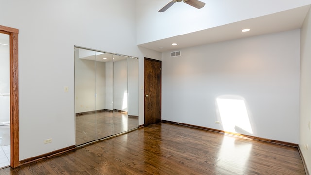 908 Claremont Dr, Downers Grove, IL 60516 - empty room featuring wood finished floors, ceiling fan, recessed lighting, and a high ceiling