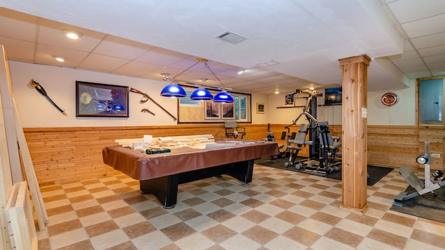 908 Claremont Dr, Downers Grove, IL 60516 - recreation room with wainscoting, light flooring, wood walls, a drop ceiling, and electric panel