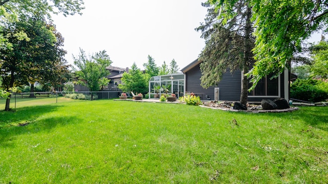 908 Claremont Dr, Downers Grove, IL 60516 - fenced backyard featuring a lanai