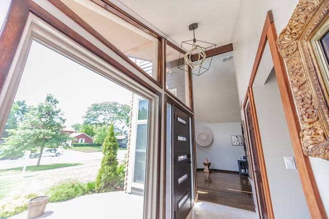 908 Claremont Dr, Downers Grove, IL 60516 - entryway featuring a chandelier, a towering ceiling, and wood finished floors