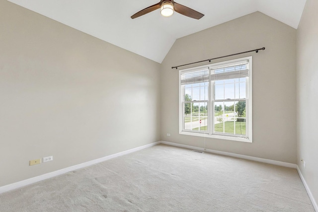 200 Saint Andrews Dr, Dekalb, IL 60115 - unfurnished room with vaulted ceiling, light carpet, and a ceiling fan