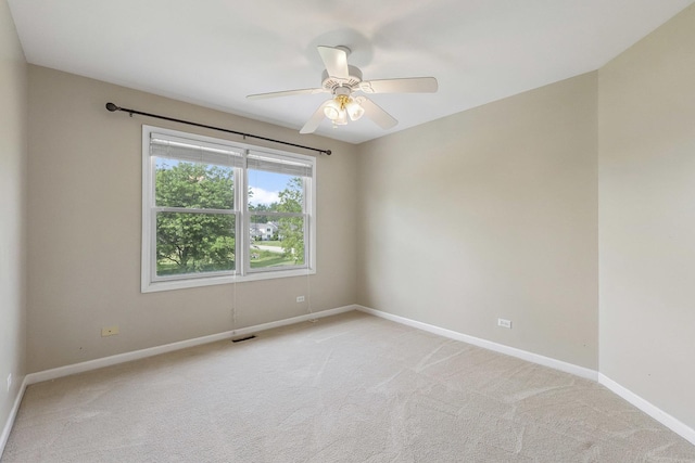 200 Saint Andrews Dr, Dekalb, IL 60115 - empty room with light colored carpet and ceiling fan