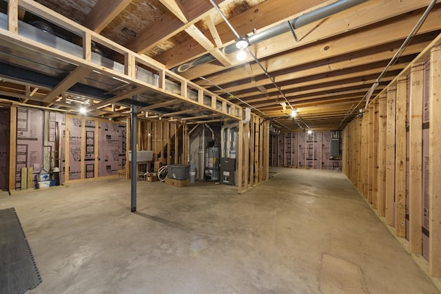 741 Oakwood St, Minooka, IL 60447 - unfinished below grade area featuring water heater