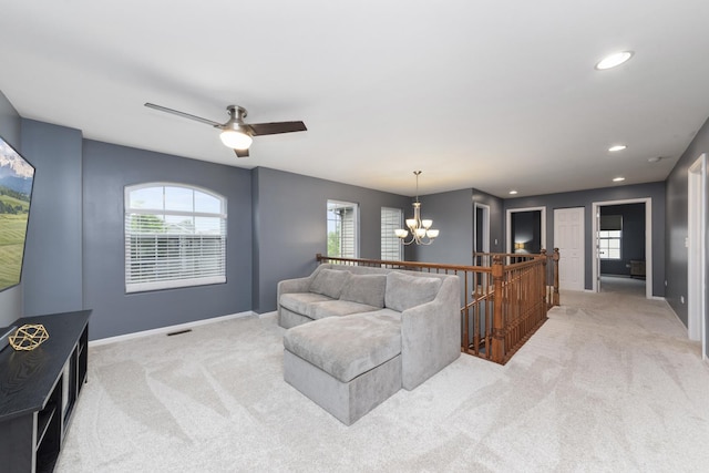 741 Oakwood St, Minooka, IL 60447 - carpeted living area featuring a chandelier, recessed lighting, and a ceiling fan