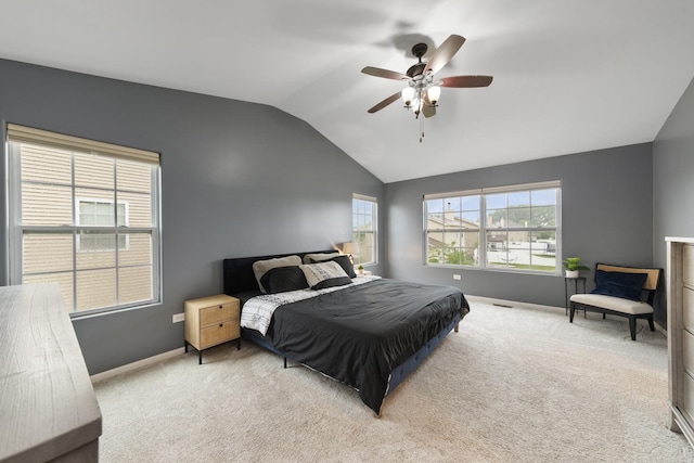 741 Oakwood St, Minooka, IL 60447 - bedroom featuring vaulted ceiling, multiple windows, light carpet, and ceiling fan