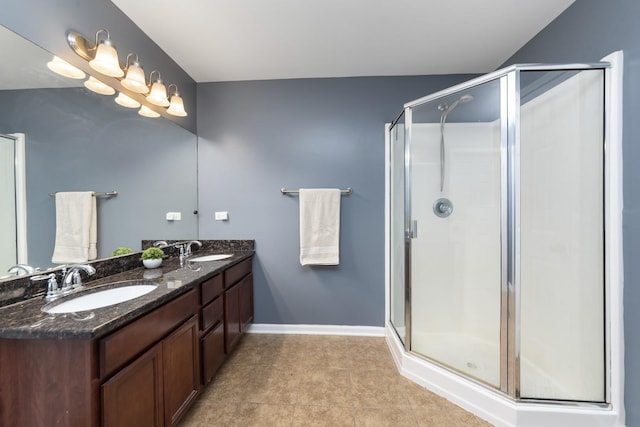 741 Oakwood St, Minooka, IL 60447 - bathroom featuring double vanity, a stall shower, and tile patterned flooring