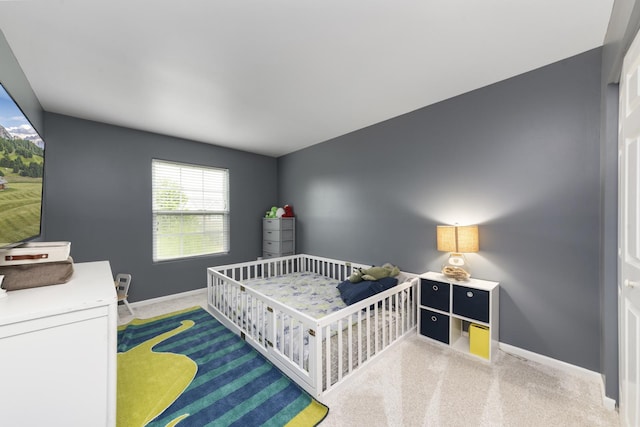 741 Oakwood St, Minooka, IL 60447 - carpeted bedroom featuring baseboards and a crib