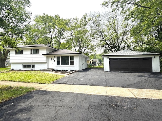126 N Prairie Ave, Bloomingdale, IL 60108 - tri-level home featuring a garage, an outdoor structure, and a front yard