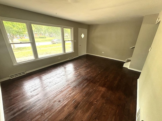 126 N Prairie Ave, Bloomingdale, IL 60108 - spare room with dark wood-style flooring and stairway