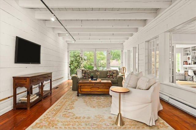 633 Forest Ave, Wilmette, IL 60091 - living area featuring a baseboard radiator, hardwood / wood-style floors, healthy amount of natural light, wood walls, and a wooden ceiling with exposed beams