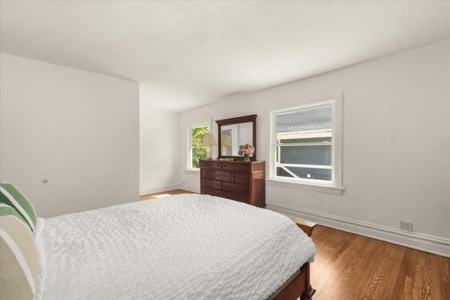 633 Forest Ave, Wilmette, IL 60091 - bedroom with wood finished floors and baseboards