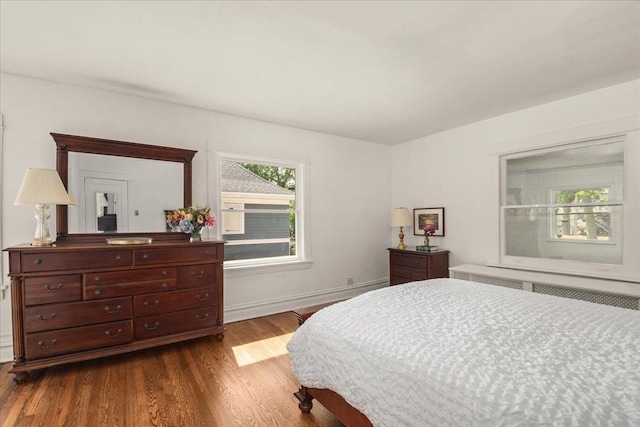 633 Forest Ave, Wilmette, IL 60091 - bedroom featuring dark wood-type flooring and radiator heating unit