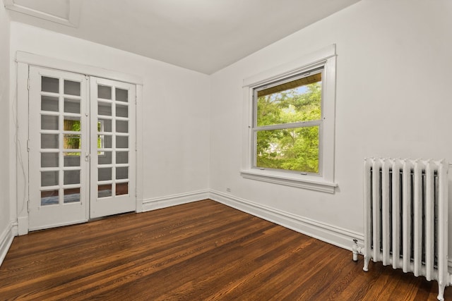 633 Forest Ave, Wilmette, IL 60091 - empty room featuring radiator and wood finished floors