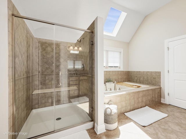 508 Gene Darfler Ct, Naperville, IL 60565 - bathroom featuring a skylight, a bath, lofted ceiling, a shower stall, and tile patterned flooring
