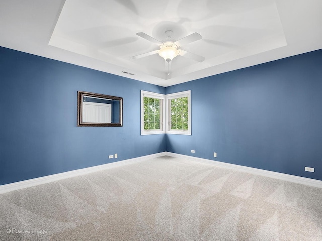 508 Gene Darfler Ct, Naperville, IL 60565 - carpeted spare room with a tray ceiling and a ceiling fan