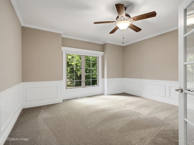 508 Gene Darfler Ct, Naperville, IL 60565 - carpeted empty room with ceiling fan, wainscoting, crown molding, and a decorative wall