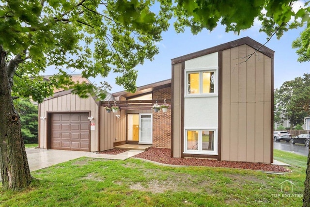 1018 Bob O Link Ln, Darien, IL 60561 - mid-century modern home with an attached garage, concrete driveway, and a front lawn