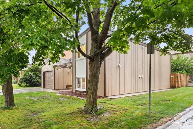 1018 Bob O Link Ln, Darien, IL 60561 - view of side of property featuring asphalt driveway and an attached garage