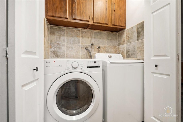 1018 Bob O Link Ln, Darien, IL 60561 - washroom with cabinet space and washing machine and dryer