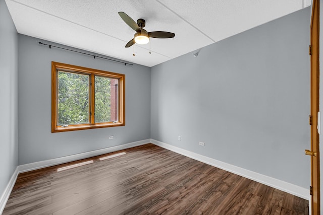 1636 Ashland Ave Unit 209, Des Plaines, IL 60016 - spare room with dark wood-type flooring, ceiling fan, and a textured ceiling