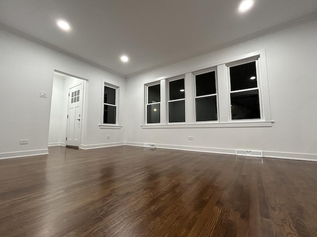 4843 W Schubert Ave, Chicago, IL 60639 - spare room with dark wood-style flooring, recessed lighting, and ornamental molding