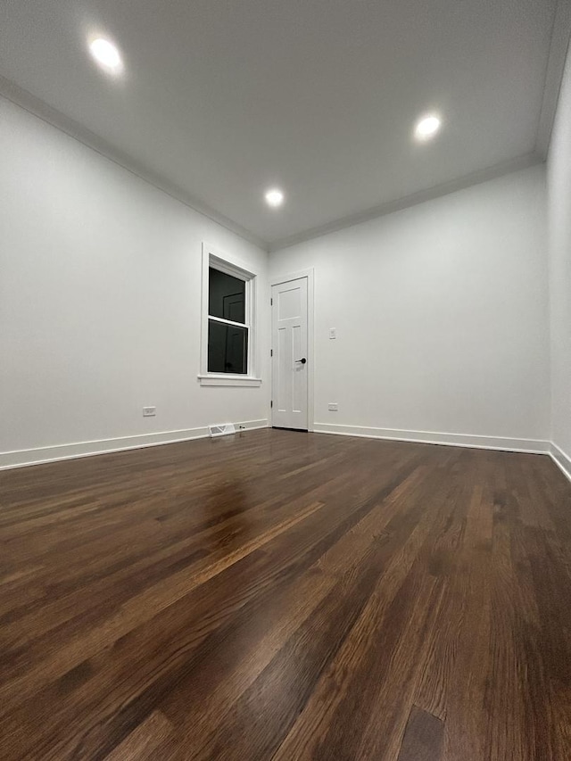 4843 W Schubert Ave, Chicago, IL 60639 - spare room with dark wood finished floors and recessed lighting