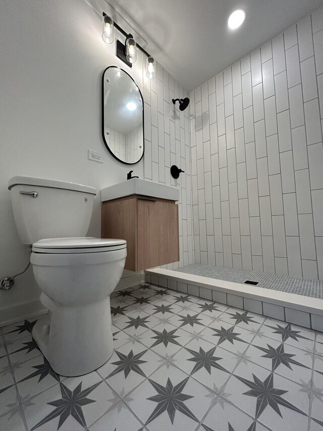 4843 W Schubert Ave, Chicago, IL 60639 - bathroom with a stall shower, vanity, and tile patterned floors
