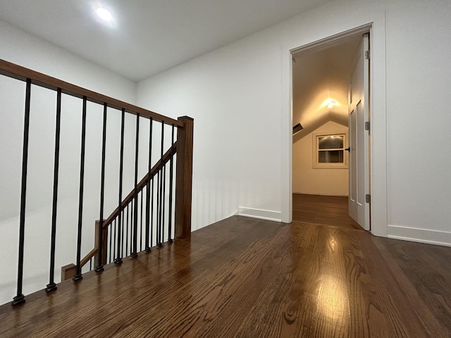 4843 W Schubert Ave, Chicago, IL 60639 - staircase featuring wood finished floors and lofted ceiling