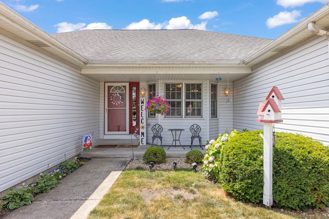 107 Sibley Dr, Minooka, IL 60447 - entrance to property featuring a porch and a shingled roof