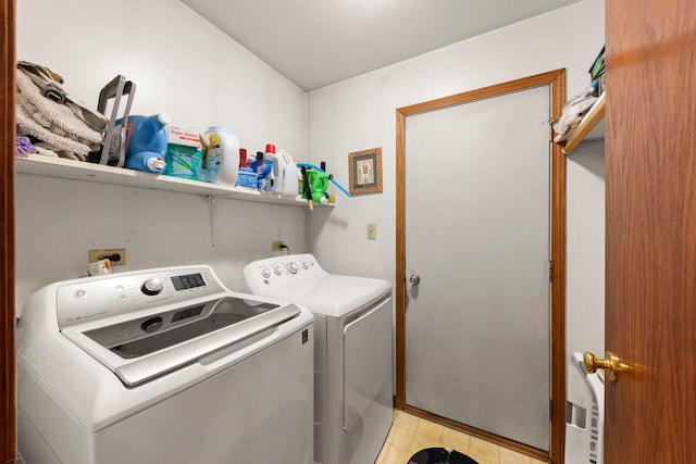 107 Sibley Dr, Minooka, IL 60447 - washroom featuring separate washer and dryer and light tile patterned floors