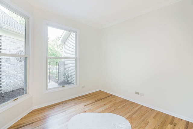 902 Heathrow Ln, Naperville, IL 60540 - unfurnished room featuring wood finished floors and baseboards