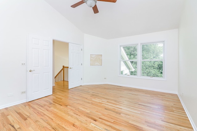 902 Heathrow Ln, Naperville, IL 60540 - unfurnished room with light wood-type flooring, ceiling fan, and high vaulted ceiling