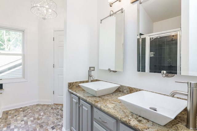 902 Heathrow Ln, Naperville, IL 60540 - bathroom featuring double vanity and tiled shower